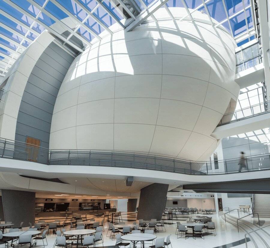 Atrium of the Duke Ellington School of the Arts with its plaster-clad egg-shaped auditorium
