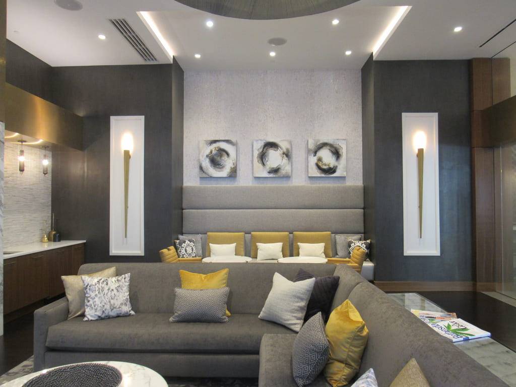 Cheval Condos living room in Bethesda with pitted plaster walls and combed perlata side panels