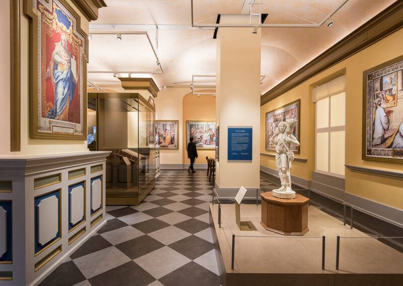 Museum gallery with hand-applied plaster walls and vaulted ceiling