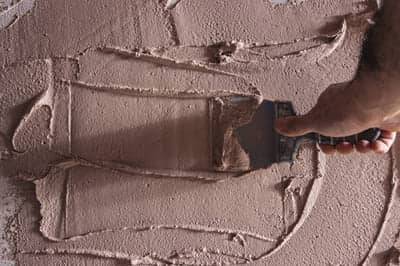 Fresh plaster being troweled